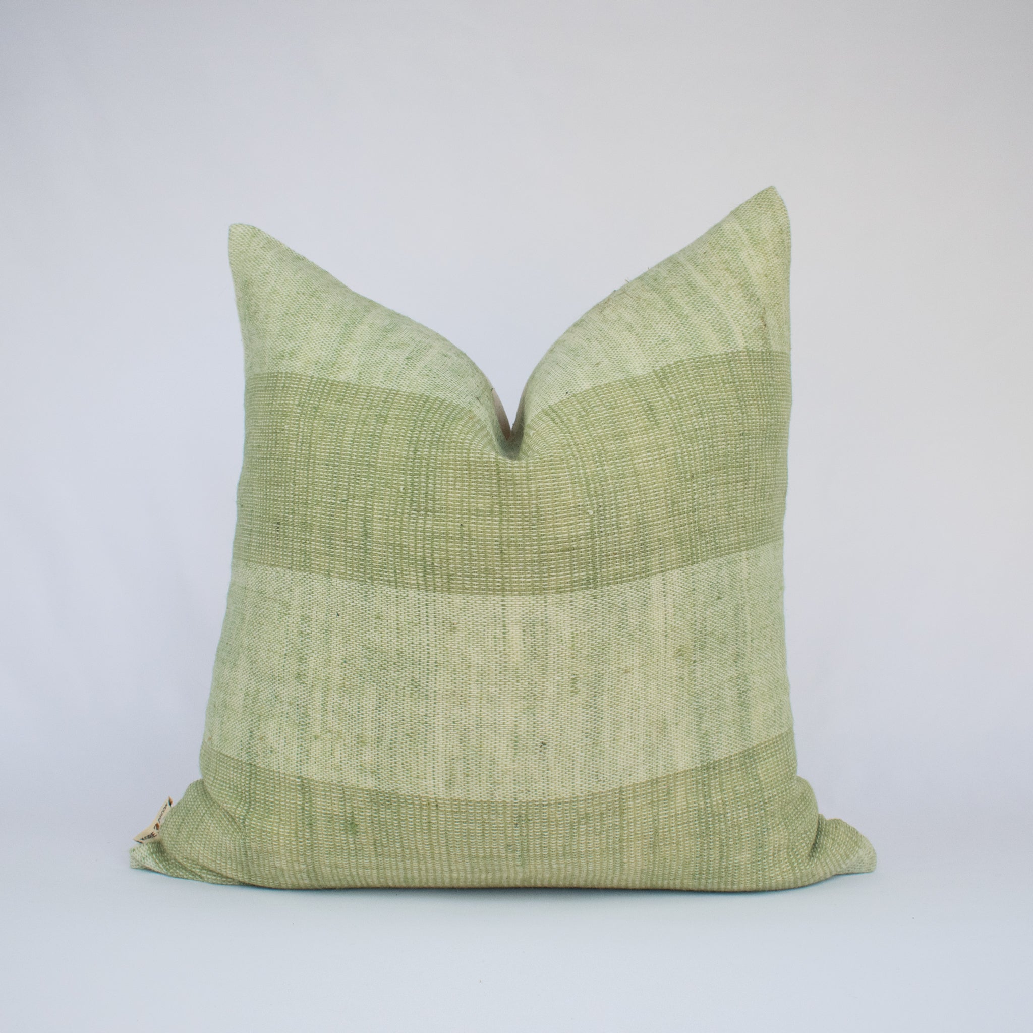 green throw pillow